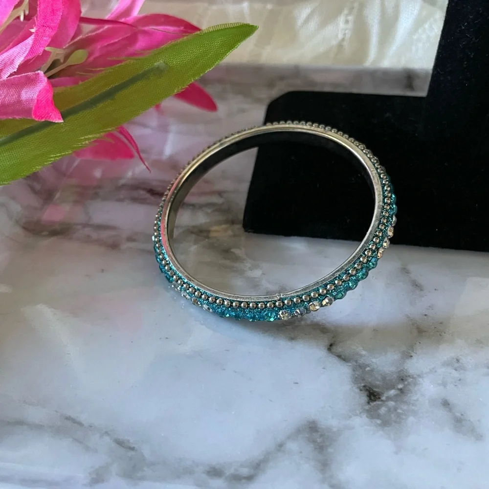 Blue and clear rhinestone silver tone bangle